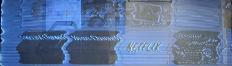 A blurry, distorted image of a Wii home screen.